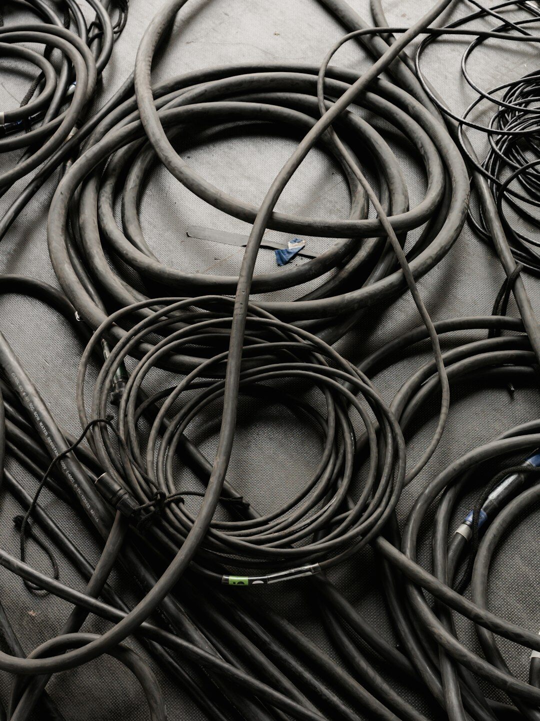 Close-up of broadcast cables and equipment racks